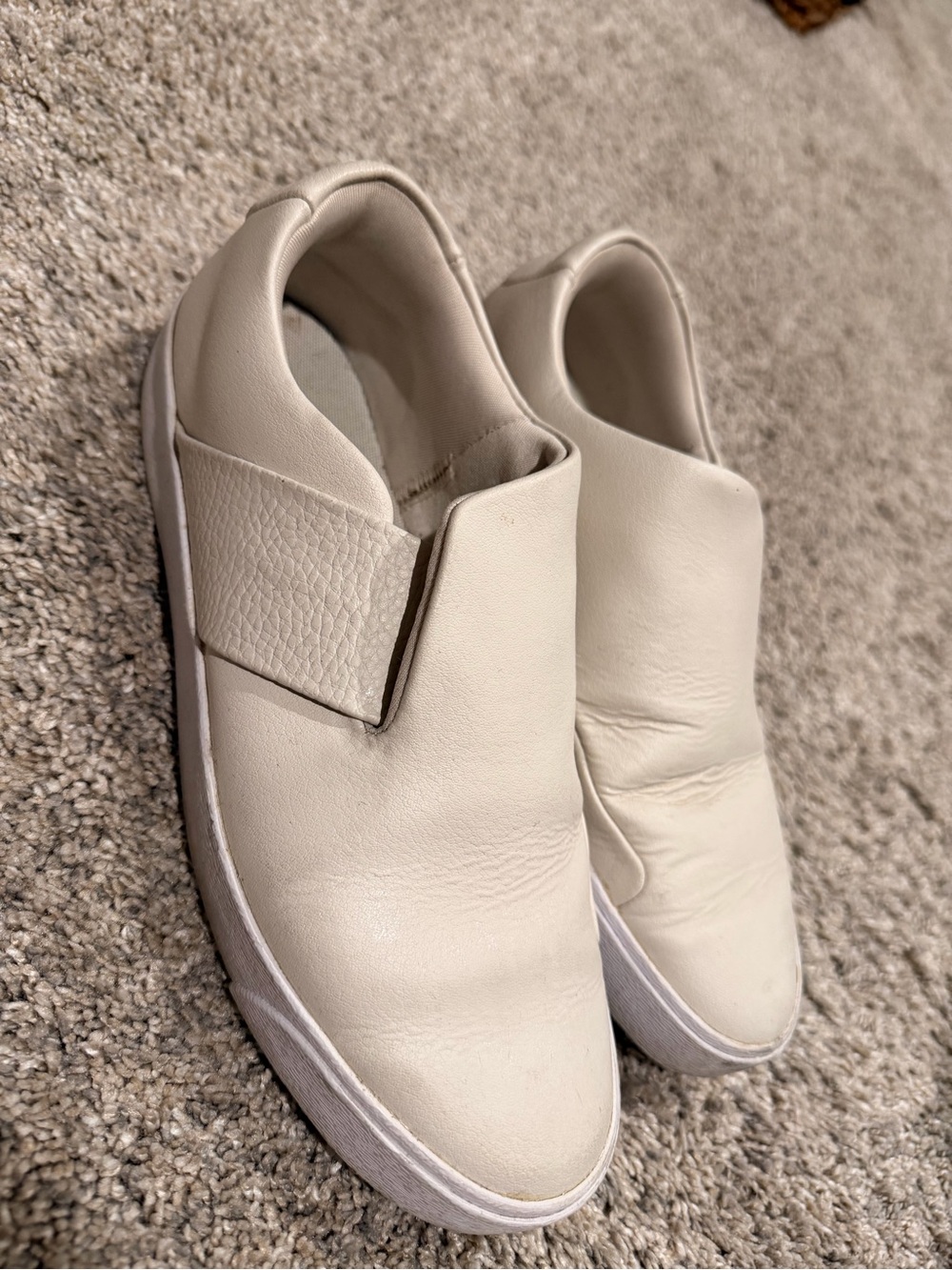 Nike Women’s White Slip-On Leather Sneakers